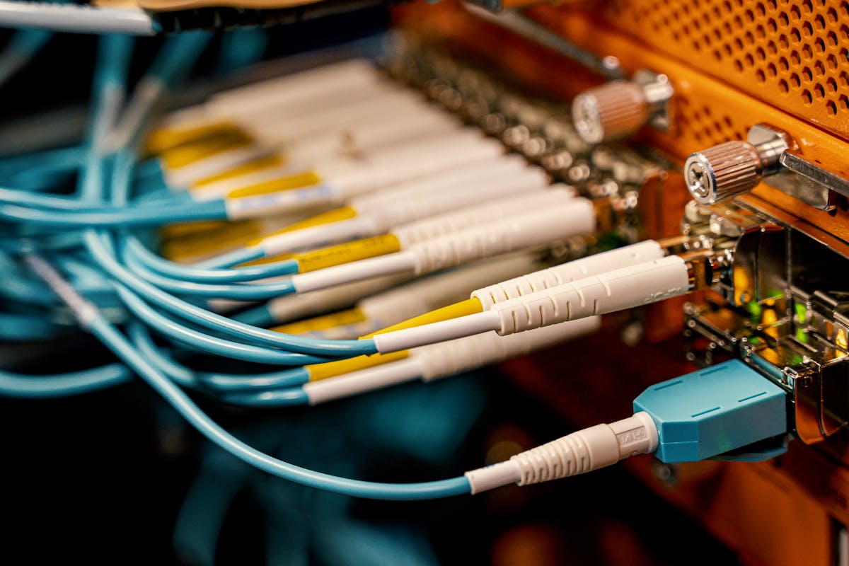Fiber optic cables with glowing connectors for low-latency trading